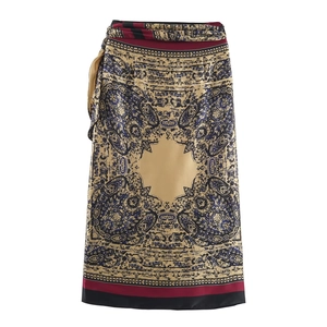 Elegant paisley print midi skirt in silk texture with beige, blue and burgundy vintage patterns