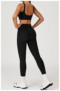 Detail view of high waisted yoga leggings with heart shaped booty lifting design