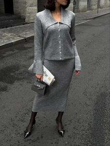 Elegant grey knit two-piece set featuring a v-neck cardigan and midi pencil skirt