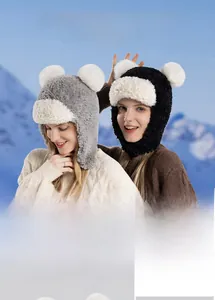 Winter plush bear earflap hat featuring thick fleece lining and white pom-pom ears