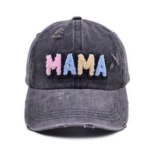 Distressed wash denim baseball cap with colorful MAMA embroidery on front