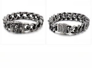 Macro detail of vintage 304 stainless steel skull bracelet with engraved floral patterns