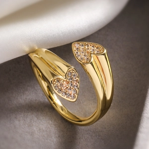 Irregular gold double heart open ring featuring sparkling pavé zircon stones