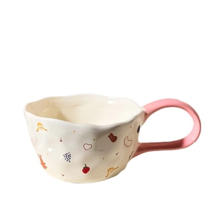 Creamy ceramic mug with pink handle and cute cartoon bunny strawberry patterns