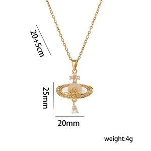 Multi-layer gold Saturn orb necklace with pearl accent and crystal teardrop pendant