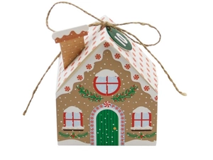 Close-up of gingerbread house Christmas treat box with chimney and twine bow decoration