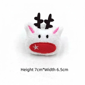 Detail shot of a small white plush reindeer charm featuring a red star nose, size 7cm x 6.5cm