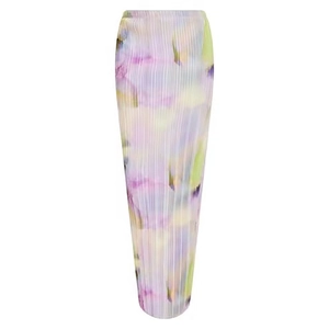Detailed close-up of pleated maxi skirt featuring abstract watercolor print and elastic waist