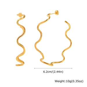 Detail showing wavy gold stainless steel hoop earrings with 6.2cm diameter and 10g weight