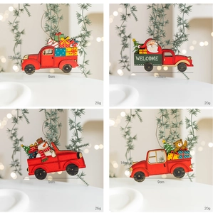 Detailed grid of four painted wooden Christmas truck ornaments with Santa and Snowman
