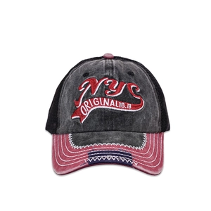 Close-up of NYC ORIGINAL embroidery on vintage washed mesh trucker baseball cap