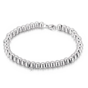 Polished stainless steel bead bracelet detail with lobster clasp on white background