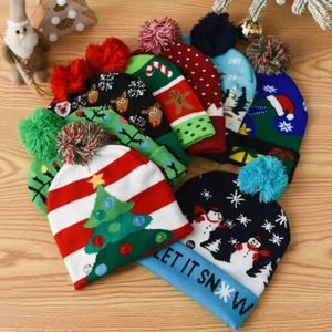 LED lighted Christmas knit beanies with reindeer patterns and colorful pom-poms