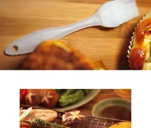 Close-up of white heat-resistant silicone pastry brush with integrated hanging hole