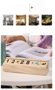 Gros plan sur un calendrier perpétuel en bois avec des blocs manuels de date et de jour