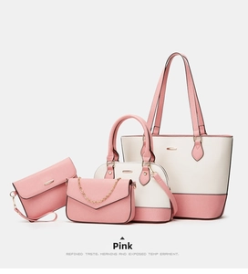 Detailed view of pink and beige 4-piece handbag set with textured cross-grain PU leather