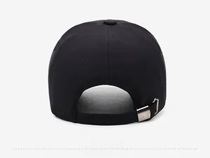 Rear view of black cotton baseball cap showing adjustable fabric strap and metal buckle