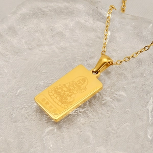 Detail of 18K gold plated square Buddha pendant with Samantabhadra engraving on glass