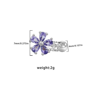 Detail view of flower stud earring with purple zircon petals and screw back ball closure