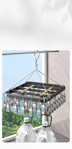 Strong aluminum drying rack with sturdy wire supports holding heavy water jugs