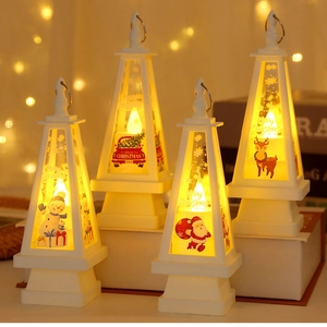 Set of 4 white pyramid LED Christmas lanterns with classic festive illustrations and warm light