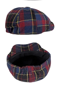 Detail of wool octagonal cap showing classic plaid texture and internal black lining