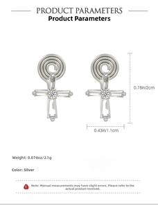 Close-up of silver cross earrings with zircon inlay including dimensions 2cm by 1.1cm