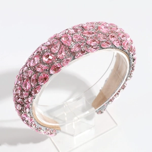 Detailed view of luxury baroque headband with pink crystals and silver base