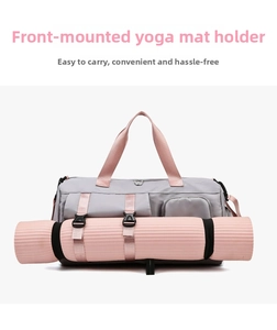 Detail showing adjustable straps for yoga mat on large capacity sports duffel bag
