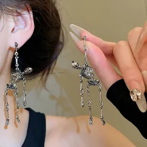 Gothic style skeleton drop earrings in vintage silver alloy with movable joints