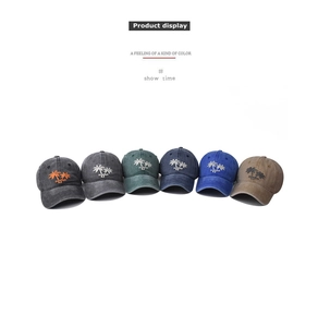 Detail of six washed cotton baseball caps with embroidered coconut trees and summer text