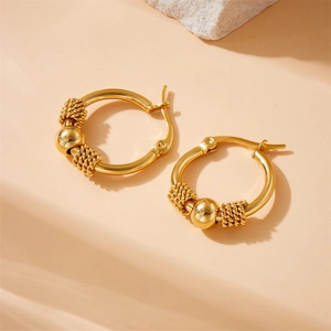 Retro gold plated stainless steel hoop earrings with textured beads on stone