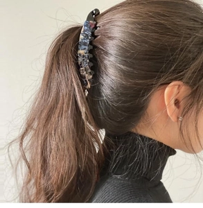 French style leopard print banana hair clip shown in hair with elegant floral patterns