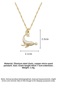 Detail of dolphin pendant dimensions with gold titanium chain and pearl accent