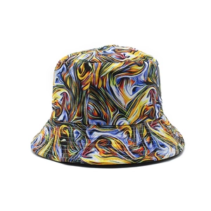 Detail shot of colorful double-sided sun hat featuring artistic tie-dye marble patterns