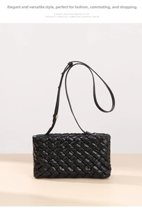 Detailed close-up of woven black leather texture with elegant gold hardware on handbag