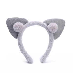 Plush grey cat ear headband with cute pompom charms on a clean white background