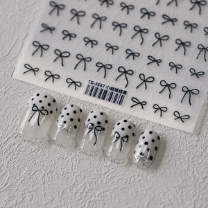Minimalist black bow nail art stickers TS-3587 with ribbon designs on a white background