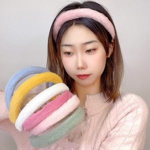 Plush padded headband in various candy colors showing soft faux fur texture for women