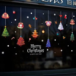 Detailed Christmas tree and animal window stickers with Merry Christmas greeting on glass