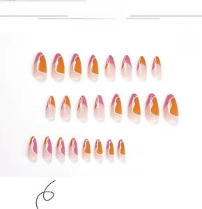 Detail view of 24pcs pink and orange press-on nails with white wave patterns in almond shape