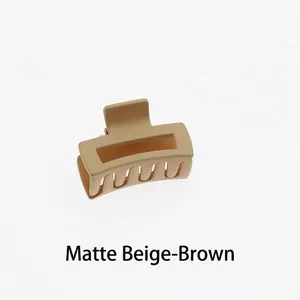 Detailed macro view of the matte beige coffee mini square claw clip with spring hinge