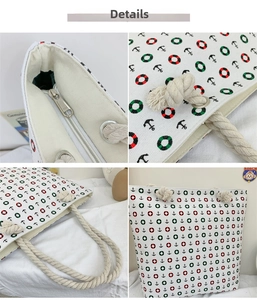 Detail view of nautical anchor print on canvas tote bag with thick rope handles and zipper