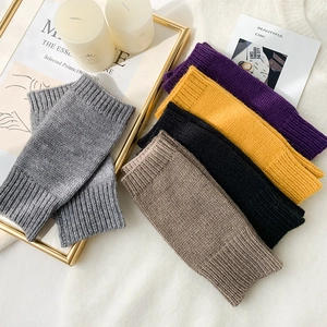 Chic women's knitted fingerless gloves in multiple colors for winter warmth and comfort