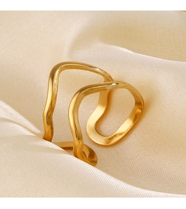 Detailed shot of gold irregular wave double-layer open ring on silk background