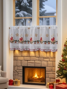Detail of Christmas cafe curtain with embroidered candles and red wavy edge