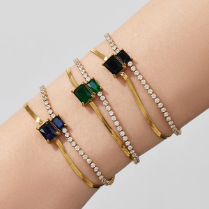 Double-layered gold bracelet featuring flat snake chain and colorful 2mm zircon stones