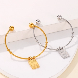 Gold and silver stainless steel open bead bracelets with engraved square pendants