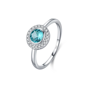 Elegant S925 sterling silver ring with blue paraiba-style gem and diamond halo