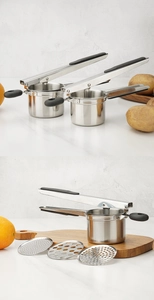 Stainless steel potato ricer with 3 interchangeable discs and black silicone handle